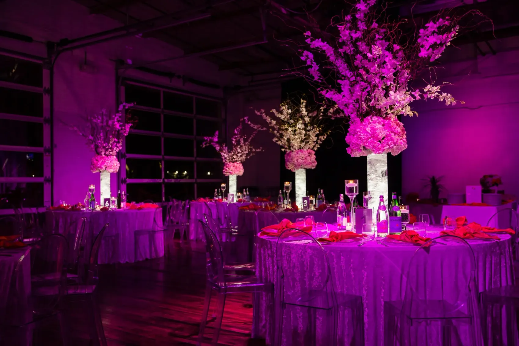 Bat Mitzvah reception in the Boathouse with pink uplighting and florals