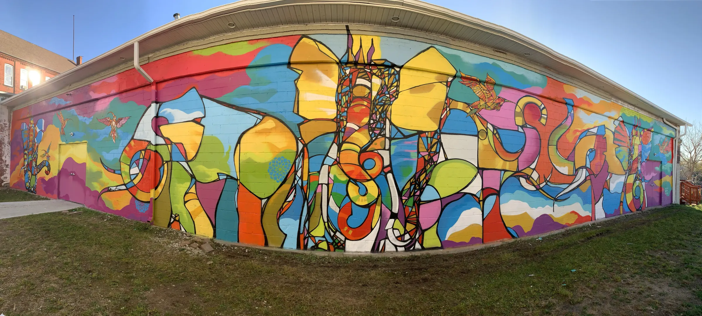 Craig Anthony Miller's Elephants mural running the full length of a Boathouse wall, one of the murals a crew can shoot without extra styling